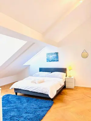 Ein Bett oder Betten in einem Zimmer der Unterkunft Simply fourth apartment