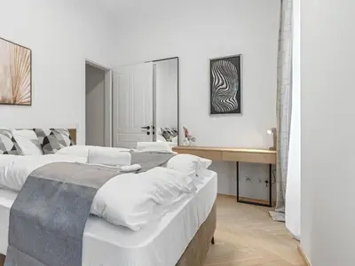 Ein Bett oder Betten in einem Zimmer der Unterkunft Living No 5 by GT7 Hospitality