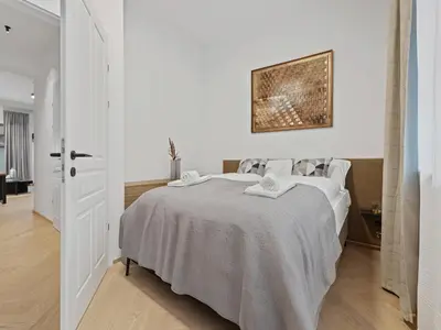 Ein Bett oder Betten in einem Zimmer der Unterkunft Living No 5 by GT7 Hospitality