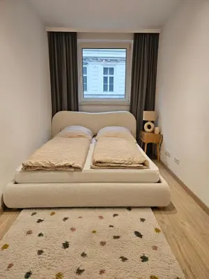 Ein Bett oder Betten in einem Zimmer der Unterkunft Luxury Apartment with Sauna in City Center