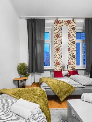 Ein Bett oder Betten in einem Zimmer der Unterkunft Near Taborstrasse 2Bedrooms for 4