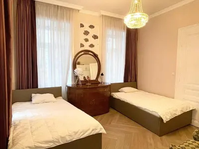Ein Bett oder Betten in einem Zimmer der Unterkunft City Apartment