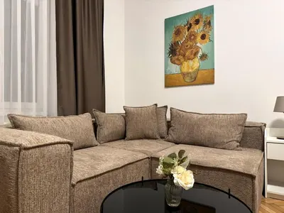 Ein Sitzbereich in der Unterkunft Modernes Studio Apartment im Stadtzentrum 16