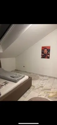 Ein Bett oder Betten in einem Zimmer der Unterkunft Apartment