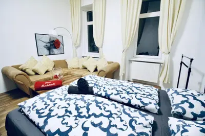 Ein Bett oder Betten in einem Zimmer der Unterkunft Modern 2BR Family-Friendly Apartment