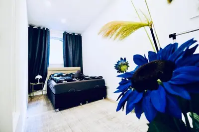 Ein Bett oder Betten in einem Zimmer der Unterkunft Budget-Friendly 2-Bedroom Apartment with Living Room for 6
