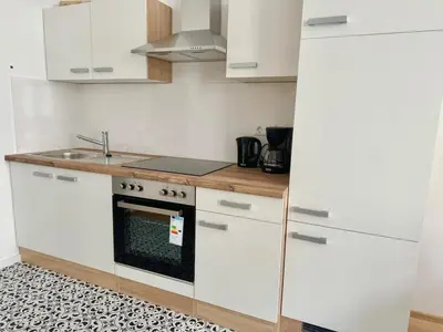 Küche/Küchenzeile in der Unterkunft Stylish & Renovated Apartment with Free Parking