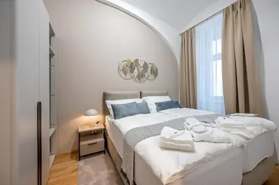Ein Bett oder Betten in einem Zimmer der Unterkunft Apartment Luxe - right near Vienna's Old City