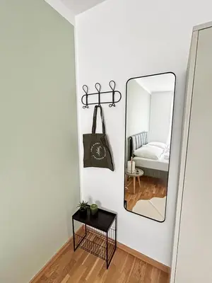 Ein Bett oder Betten in einem Zimmer der Unterkunft Zentrales Business Apartment mit Schlafzimmer