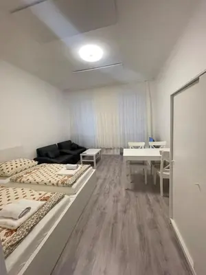 Ein Bett oder Betten in einem Zimmer der Unterkunft Ettenreichgasse