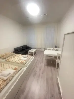 Ein Bett oder Betten in einem Zimmer der Unterkunft Ettenreichgasse