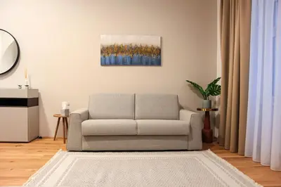 Ein Sitzbereich in der Unterkunft Apartment Comfort - right near Vienna's Old City
