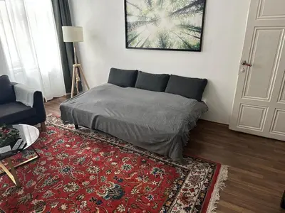 Ein Bett oder Betten in einem Zimmer der Unterkunft Charming new apartment in Vienna next to Stadthalle