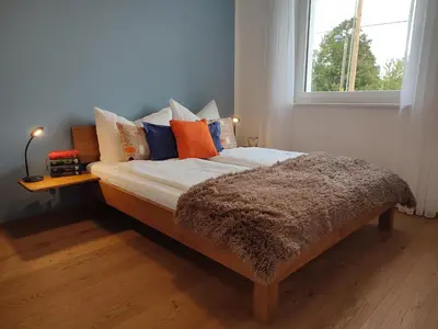 Ein Bett oder Betten in einem Zimmer der Unterkunft Modernes Zimmer mit kostenlosem Parkplatz - LIMA Vermietung