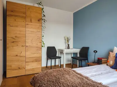 Ein Bett oder Betten in einem Zimmer der Unterkunft Modernes Zimmer mit kostenlosem Parkplatz - LIMA Vermietung
