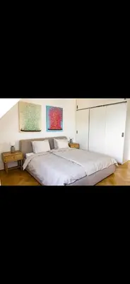 Ein Bett oder Betten in einem Zimmer der Unterkunft Rooftop Apartment in central Vienna
