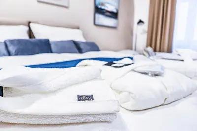 Ein Bett oder Betten in einem Zimmer der Unterkunft Apartment Deluxe - right near Vienna's Old City