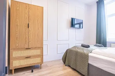 Ein Bett oder Betten in einem Zimmer der Unterkunft Bright and Modern Room in Meidling District Vienna