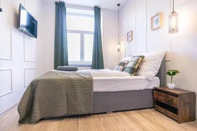 Ein Bett oder Betten in einem Zimmer der Unterkunft Bright and Modern Room in Meidling District Vienna
