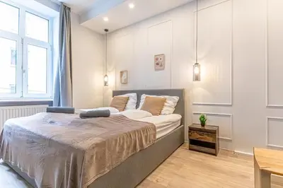 Ein Bett oder Betten in einem Zimmer der Unterkunft Chic Studio Apartment at 12th District in Vienna
