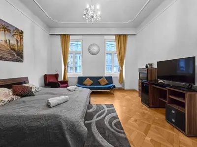 Ein Bett oder Betten in einem Zimmer der Unterkunft 4Rooms center