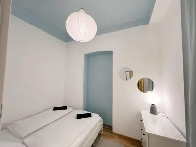 Ein Bett oder Betten in einem Zimmer der Unterkunft Family & Friends Apartment at Stadthalle