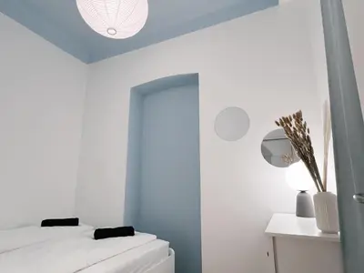 Ein Bett oder Betten in einem Zimmer der Unterkunft Family & Friends Apartment at Stadthalle