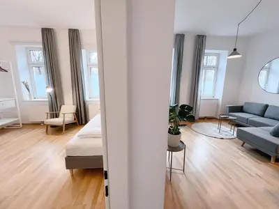 Ein Sitzbereich in der Unterkunft Family & Friends Apartment at Stadthalle