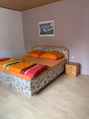 Ein Bett oder Betten in einem Zimmer der Unterkunft Comfortable, family-friendly and top located