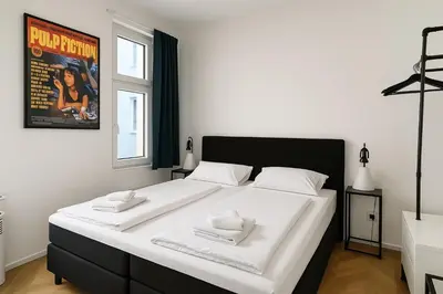 Ein Bett oder Betten in einem Zimmer der Unterkunft City Center Apartments