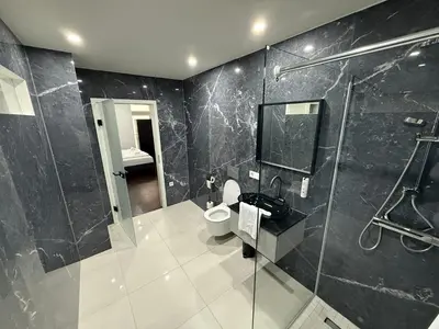 Ein Badezimmer in der Unterkunft City Center Apartments