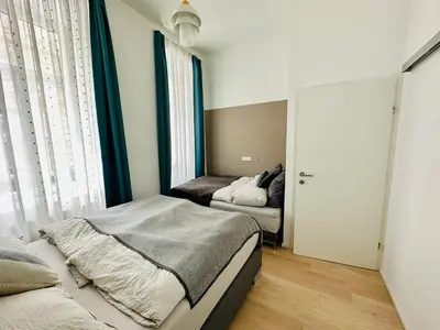 Ein Bett oder Betten in einem Zimmer der Unterkunft Panda Apartment