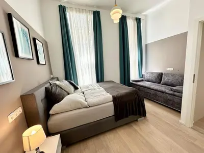 Ein Sitzbereich in der Unterkunft Panda Apartment