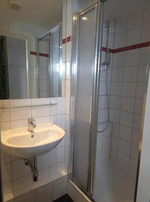 Ein Badezimmer in der Unterkunft Aparthotel Amelie