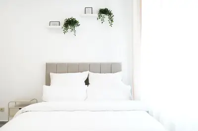 Ein Bett oder Betten in einem Zimmer der Unterkunft Design Wohnung nahe dem Zentrum