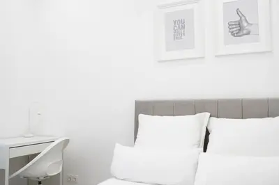 Ein Bett oder Betten in einem Zimmer der Unterkunft Design Wohnung nahe dem Zentrum