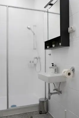 Ein Badezimmer in der Unterkunft Design Wohnung nahe dem Zentrum