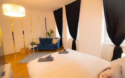 Ein Bett oder Betten in einem Zimmer der Unterkunft Urbane Oase l LF11