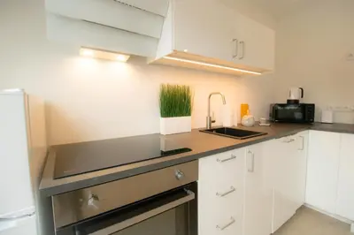 Küche/Küchenzeile in der Unterkunft Central, Stylish and Modern l JOS24