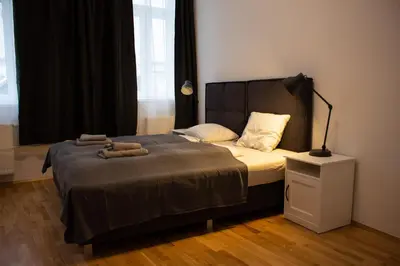 Ein Bett oder Betten in einem Zimmer der Unterkunft Klimt Mezzanin
