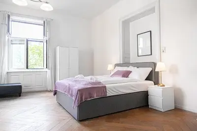 Ein Bett oder Betten in einem Zimmer der Unterkunft Two Charming Apartments near Volksoper & AKH