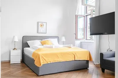 Ein Bett oder Betten in einem Zimmer der Unterkunft Two Charming Apartments near Volksoper & AKH