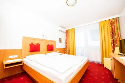Ein Bett oder Betten in einem Zimmer der Unterkunft Landgasthof zur Goldenen Traube