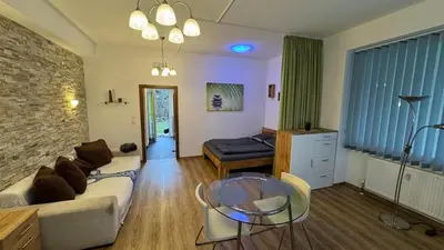 Ein Sitzbereich in der Unterkunft Ruhiges Apartment mit guter Verkehrsanbindung