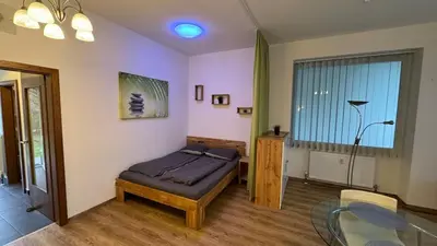 Ein Bett oder Betten in einem Zimmer der Unterkunft Ruhiges Apartment mit guter Verkehrsanbindung