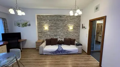Ein Bett oder Betten in einem Zimmer der Unterkunft Ruhiges Apartment mit guter Verkehrsanbindung