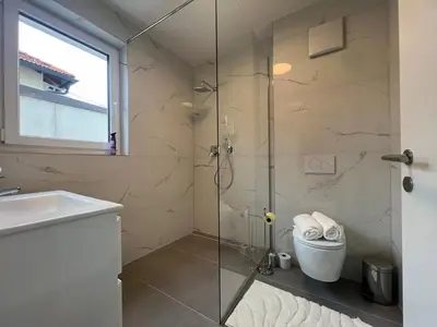 Ein Badezimmer in der Unterkunft Leopoldsdorf Premium Apartments