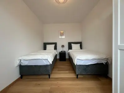 Ein Bett oder Betten in einem Zimmer der Unterkunft Leopoldsdorf Premium Apartments
