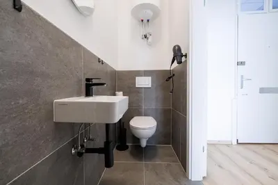 Ein Badezimmer in der Unterkunft Central Apartments - Hauptbahnhof