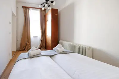 Ein Bett oder Betten in einem Zimmer der Unterkunft Central Apartments - Hauptbahnhof